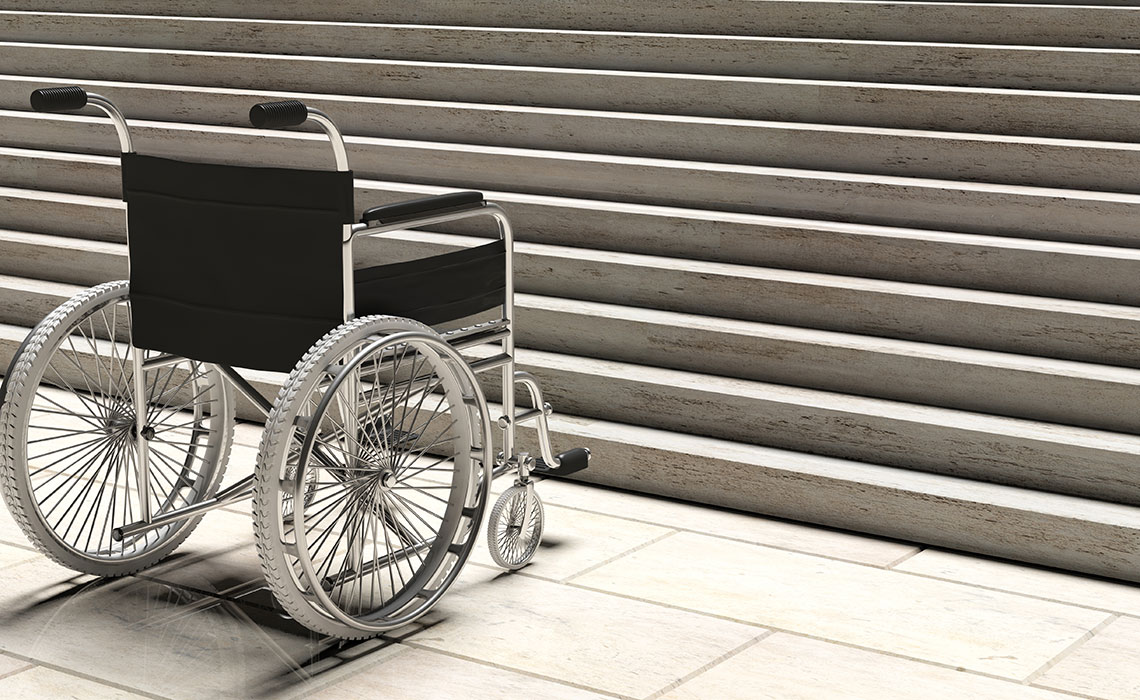 Wheelchair at base of stairs